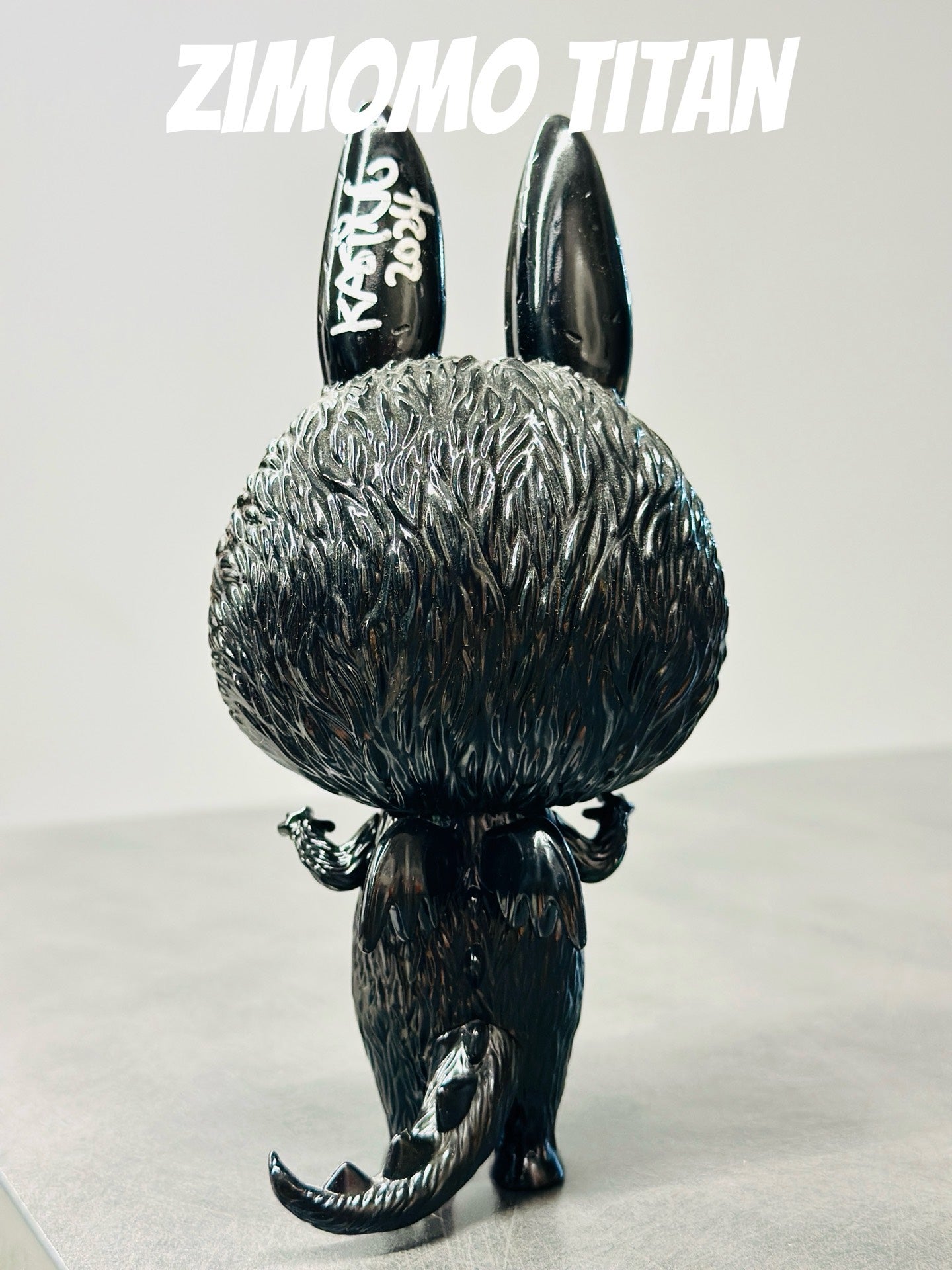 Zimomo Titan Black Titan with wings, signed by Long Jiasheng