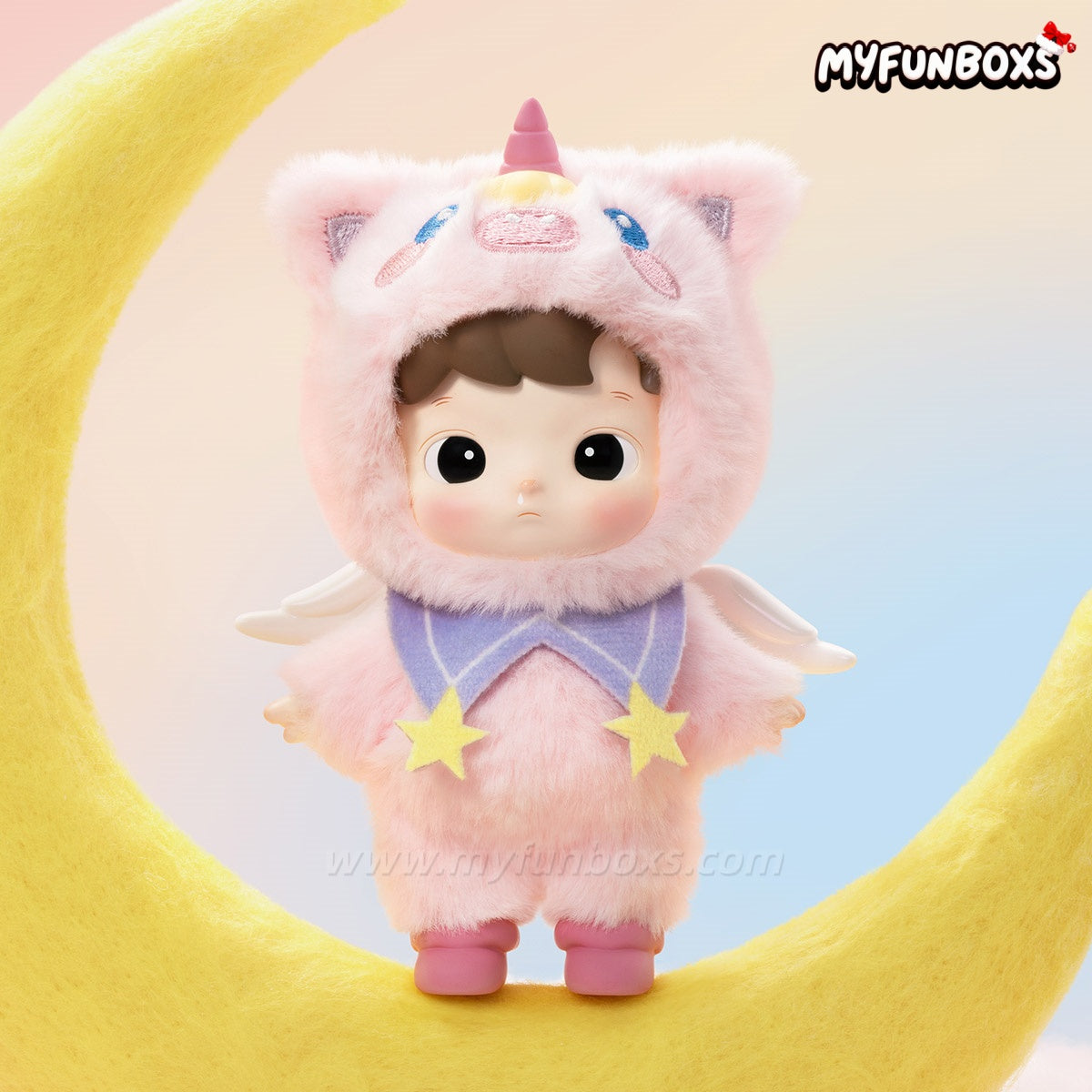 Pink unicorn-costumed Hacipupu figurine standing on yellow crescent moon