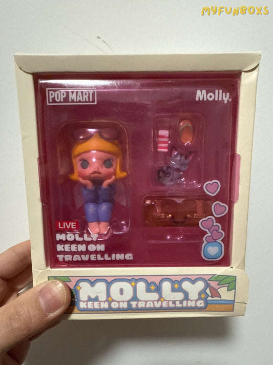 Pop Mart  Molly "I Want to Travel" figurine. Brand new, unopened. Rare. Perfect for a collector's item.